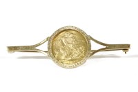 Lot 20 - An 1974 sovereign in a 9ct gold claw set to a bar brooch mount