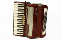 Lot 210 - A red lacquered Sonola piano accordion