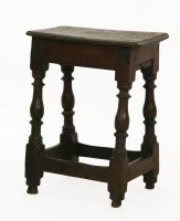 Lot 433 - A 17th century and later oak coffin stool