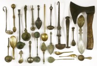 Lot 157 - A collection of Middle Eastern metal ware cutlery and implements
