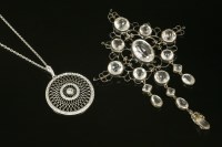 Lot 646 - A late Georgian silver rock crystal set lozenge-shaped pendant