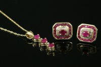 Lot 721 - A 9ct pair of gold hexagonal ruby and diamond cluster earrings