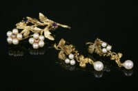 Lot 739 - A 9ct gold cultured pearl and amethyst spray brooch