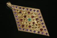 Lot 715 - A 9ct gold lozenge shaped pendant