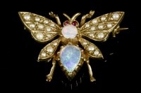 Lot 716 - A gold opal and cultured pearl moth/butterfly brooch