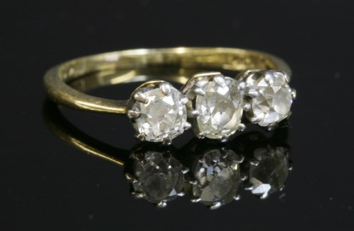 Lot 94 - A three stone diamond ring