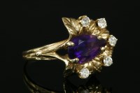 Lot 751 - An amethyst and diamond pear-shaped cluster ring