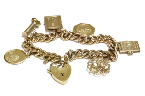 Lot 19 - A 9ct gold filed curb link charm bracelet