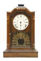 Lot 167 - An early 20th century Seth Thomas walnut mantel clock