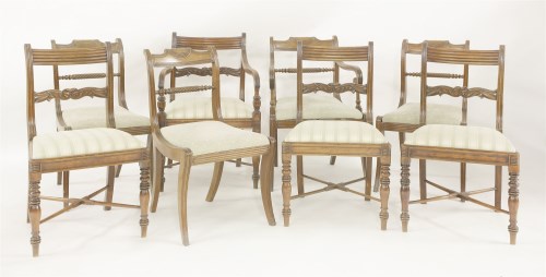 Lot 408 - A set of four George III mahogany bar back dining chairs