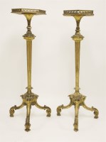 Lot 932 - A pair of Chippendale-style carved limewood and purple heart gilt torchères
