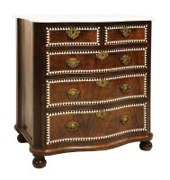 Lot 934 - A serpentine-fronted commode chest