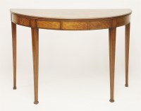 Lot 938 - A satinwood and mahogany demilune console table