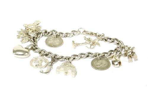 Lot 72 - A silver curb link charm bracelet