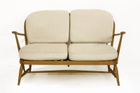 Lot 452 - An Ercol two-seater settee