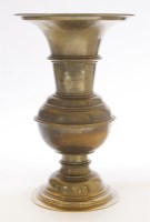 Lot 384 - A Continental cast brass cylindrical baluster vase
