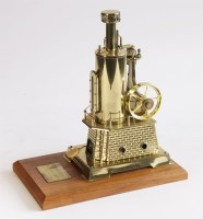Lot 385 - A brass scale model of the tinworks steam engine