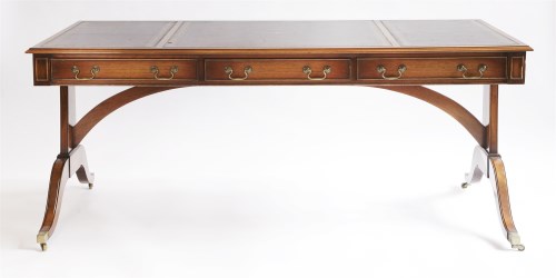 Lot 432 - A reproduction mahogany writing table