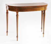 Lot 434 - A George III mahogany strung and crossbanded demi-lune card table