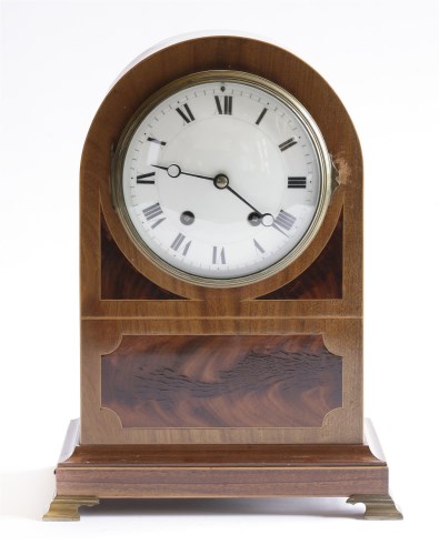 Lot 415 - An Edwardian strung mahogany mantel clock