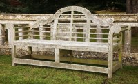 Lot 555 - A teak garden seat in the manner of Edwin Lutyens