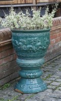 Lot 562 - A pair of modern terracotta garden urns