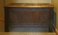 Lot 534 - An oak three-panel coffer