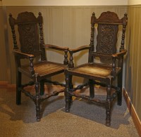 Lot 537 - A pair of oak wainscot chairs