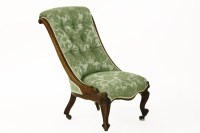 Lot 404 - A rosewood Victorian nursing chair on cabriole legs