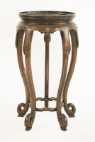 Lot 1328 - A Chinese hardwood vase stand