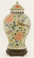 Lot 1056 - A Chinese wucai vase and cover