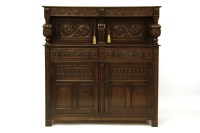 Lot 354 - A 17th century style oak court cupboard