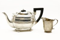 Lot 129 - A silver Harrison Brothers and George Howson of Sheffield tea pot