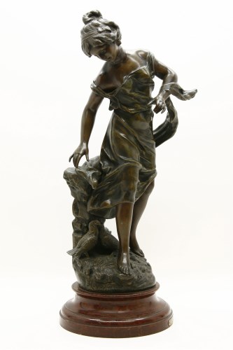 Lot 278 - A Spelter figure of a girl after Rousseau