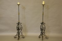 Lot 437A - A pair of 17th century style wrought iron and brass mounted large candle prickets