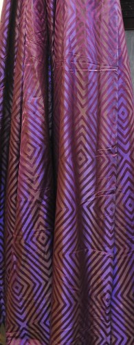 Lot 440 - Three pairs of lined purple silk curtains