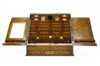 Lot 220 - A late 19th century oak stationery box