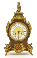 Lot 520 - A Louis XV-style tortoiseshell and gilt bronze-mounted mantel clock