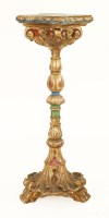 Lot 638 - A carved and gilt painted torchère