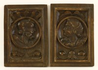 Lot 565 - A pair of French walnut Romayne carved panels