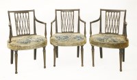 Lot 639 - A set of three Regency period painted and ebonised elbow chairs