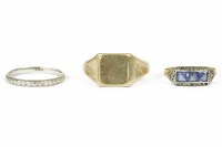 Lot 21 - A wedding ring with floral decoration marked PLAT 2.66g