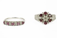 Lot 17 - An 18ct white gold illusion set diamond and ruby cluster ring