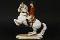 Lot 193 - A Vienna porcelain rearing horse and rider