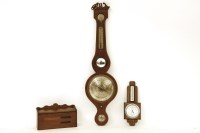 Lot 443 - A 19th Century mahogany boxwood strung barometer by I. Sordelli of London with swan neck pediment