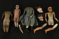 Lot 334 - Three bisque head and leather bodied dolls