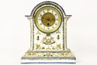 Lot 163 - A pottery mantel clock