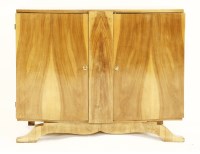 Lot 568 - A French walnut cabinet