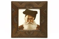 Lot 487 - A painted ceramic tile of a man with a beard