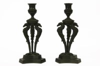 Lot 151 - A pair of continental bronze candlesticks